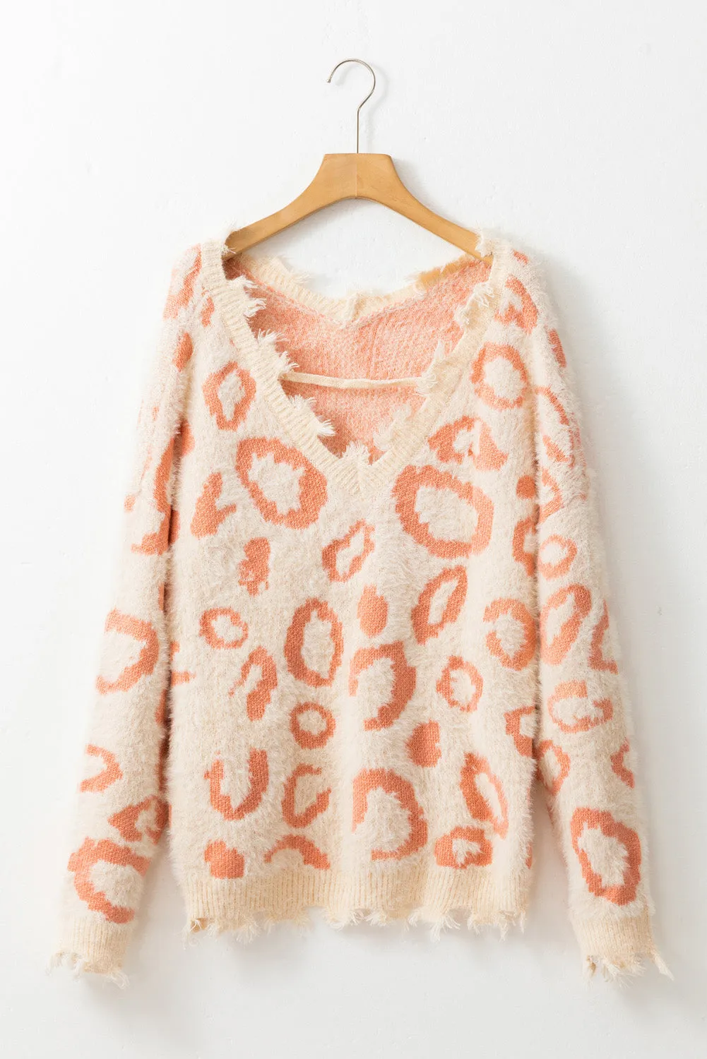 Distressed Trim Leopard V-Neck Sweater | Sweaters | Casual Sweater